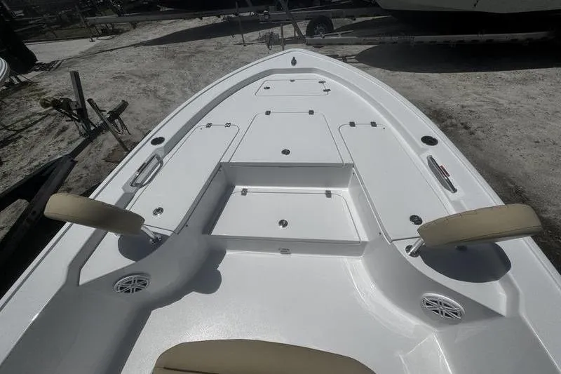 Slide: The Image of 2026 Sportsman Masters 247 Bay Boat deck with storage compartments and seating. - 19