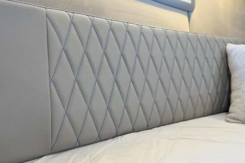 Slide: The Image of Quilted leather headboard in Hanover 347, 2027 model, with elegant diamond stitching. - 12