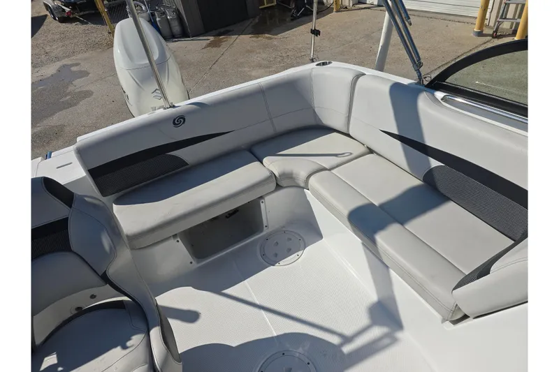 Slide: The Image of 2020 Hurricane SunDeck 187 OB boat interior with spacious seating and modern design. - 10