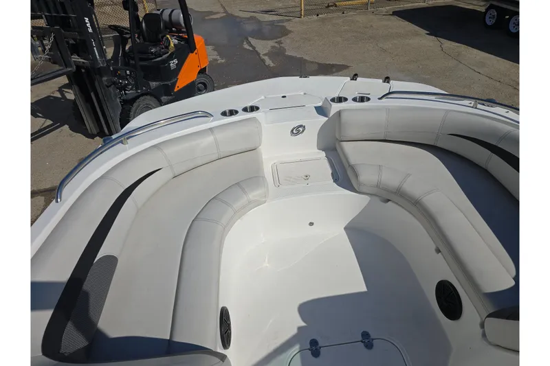 Slide: The Image of 2020 Hurricane SunDeck 187 OB boat interior with spacious seating and cup holders. - 13