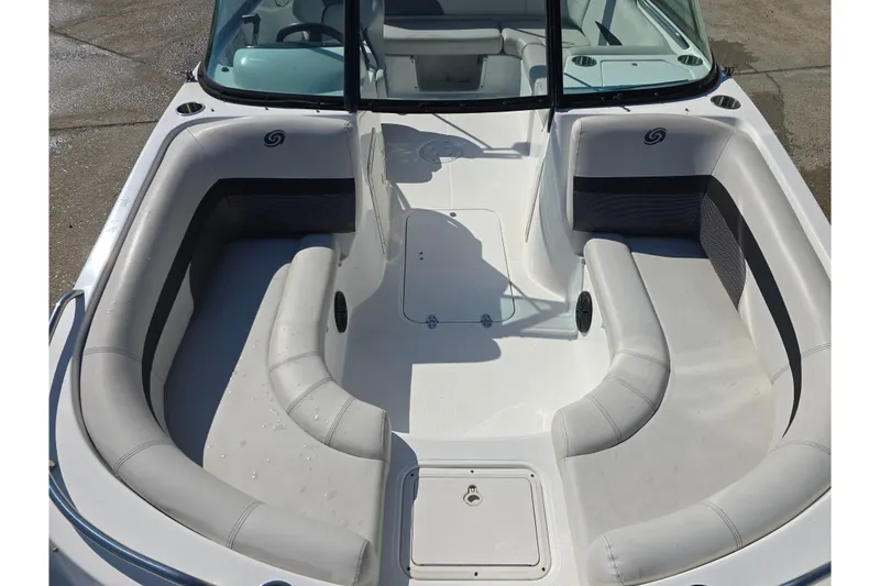 Slide: The Image of 2020 Hurricane SunDeck 187 OB boat interior with spacious seating and sleek design. - 9