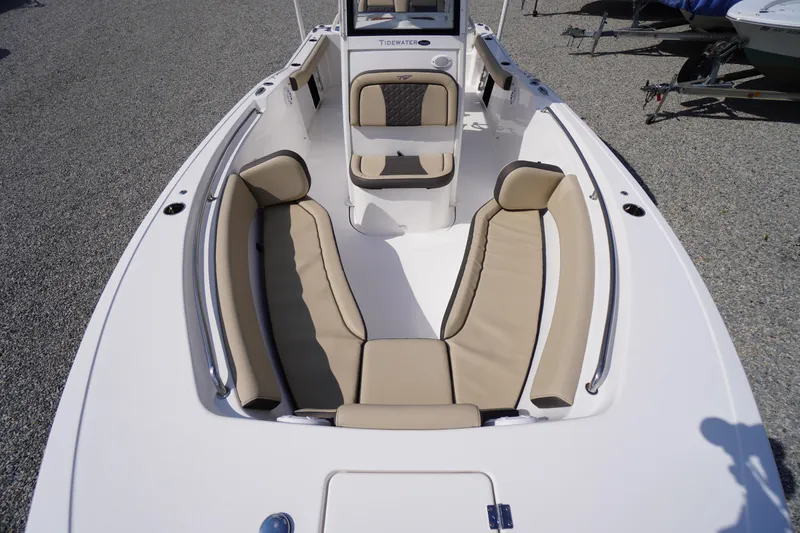 Slide: The Image of 2023 Tidewater 232 CC Adventure boat with spacious seating and modern design. - 38