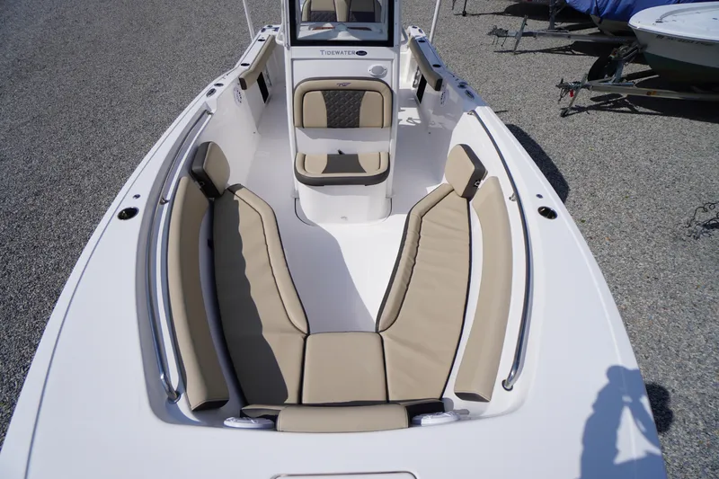 Slide: The Image of 2023 Tidewater 232 CC Adventure boat with spacious seating and modern design. - 39
