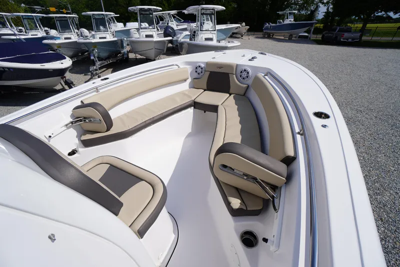 Slide: The Image of 2023 Tidewater 232 CC Adventure boat with spacious seating and modern design. - 41