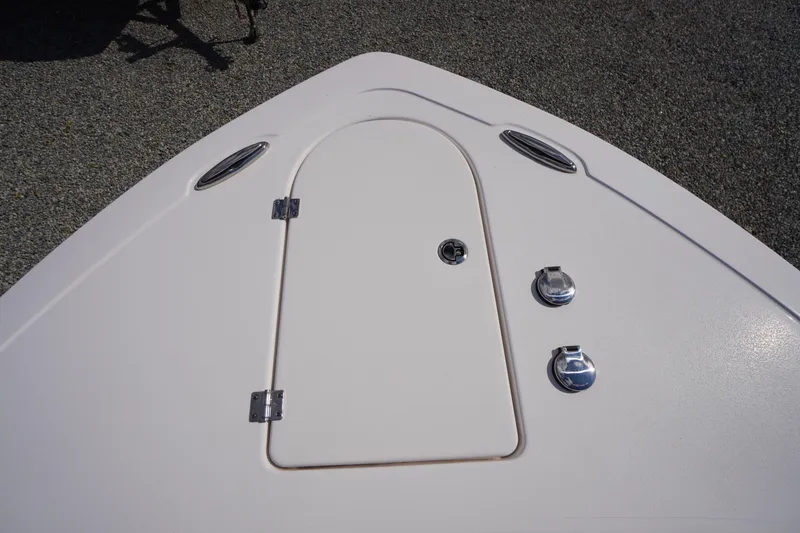 Slide: The Image of Bow deck of 2023 Tidewater 232 CC Adventure boat with hatch and fittings. - 55