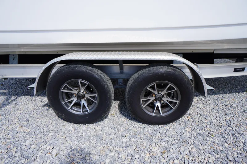 Slide: The Image of Trailer wheels of 2023 Tidewater 232 CC Adventure on gravel surface. - 6