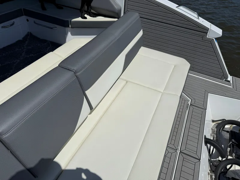Slide: The Image of Interior of a 2021 Cruisers Yachts 38 GLS with gray and white seating. - 19