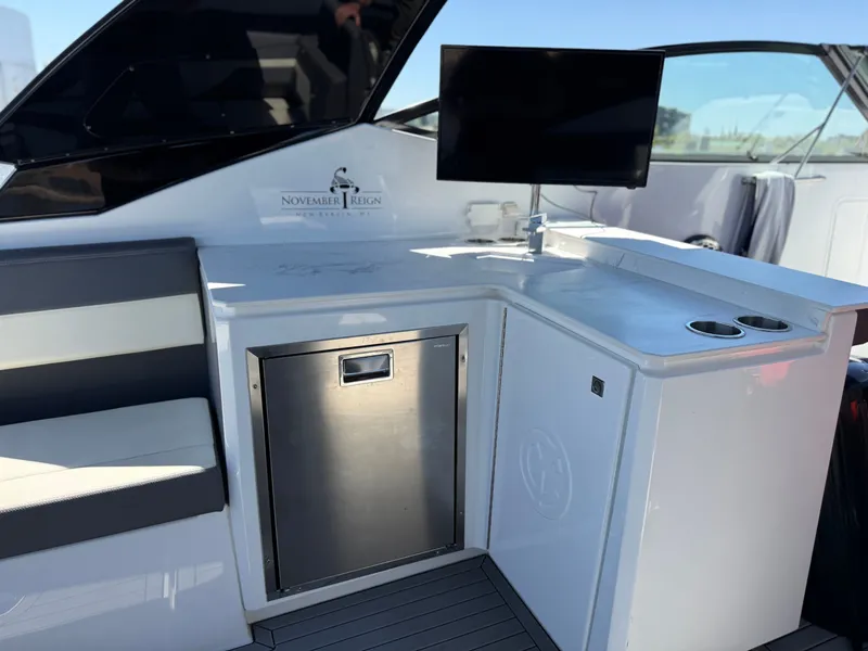 Slide: The Image of Interior of 2021 Cruisers Yachts 38 GLS with TV and seating area. - 27