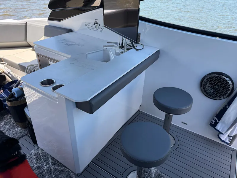 Slide: The Image of Interior of 2021 Cruisers Yachts 38 GLS with bar and seating. - 28