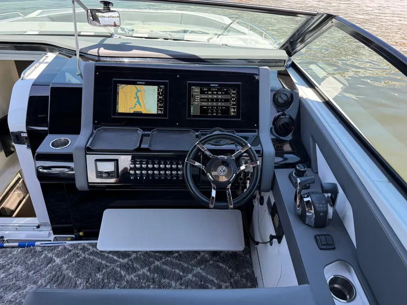 Slide: The Image of 2021 Cruisers Yachts 38 GLS cockpit with modern navigation system. - 30