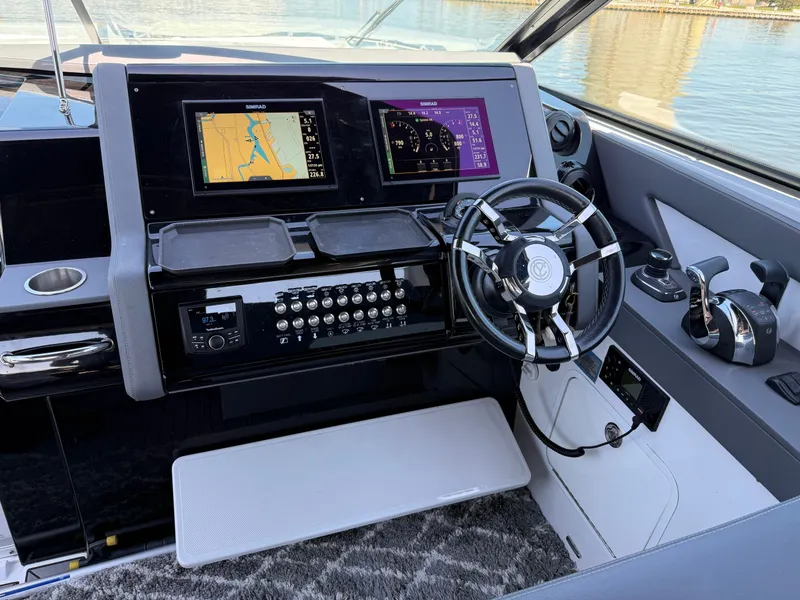 Slide: The Image of Cockpit of 2021 Cruisers Yachts 38 GLS with modern navigation systems. - 32