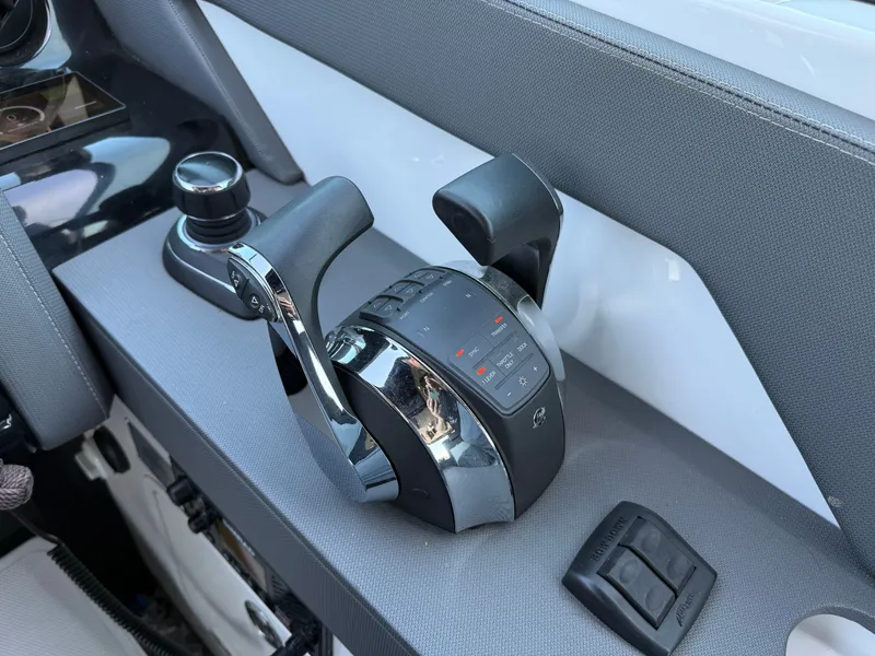 Slide: The Image of Control console of 2021 Cruisers Yachts 38 GLS with controls. - 36