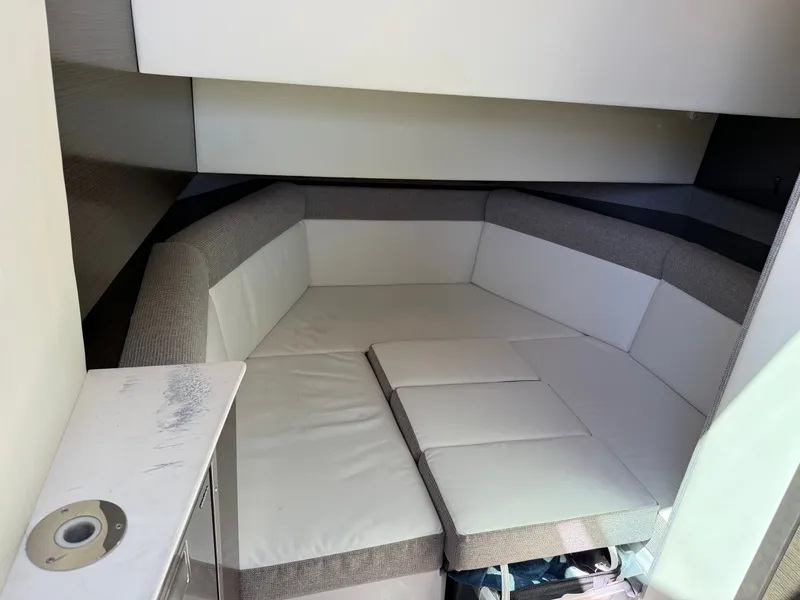 Slide: The Image of Interior of 2021 Cruisers Yachts 38 GLS with cushioned seating area. - 46