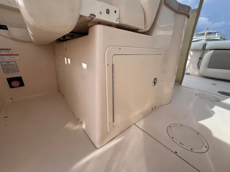 Slide: The Image of Storage compartment on a 2009 Grady-White Tournament 307 boat. - 33