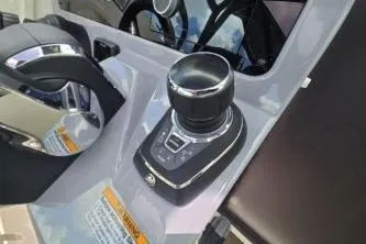 Slide: The Image of 2024 Navan S30 control panel with joystick and steering wheel. - 11