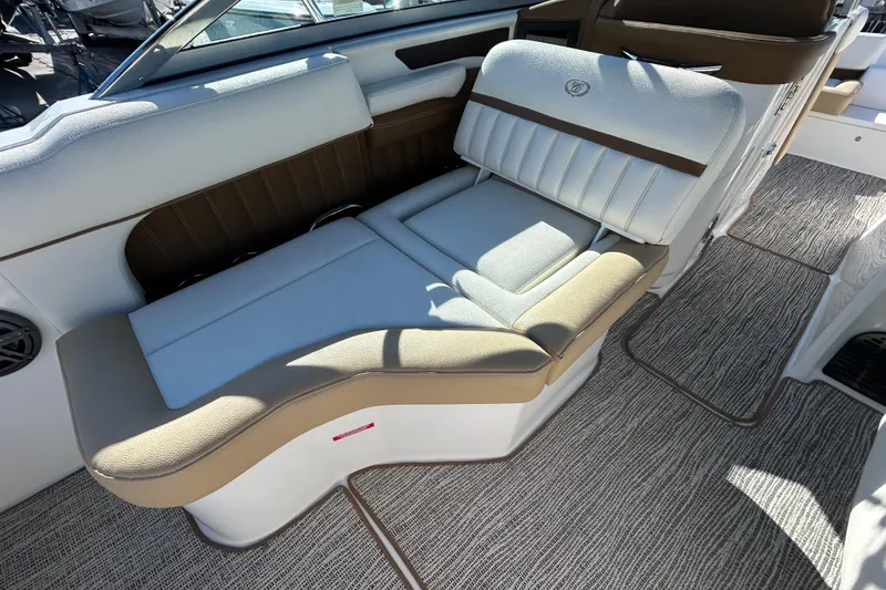Slide: The Image of Luxurious seating on a 2018 Cobalt 25SC boat with elegant upholstery and spacious design. - 22