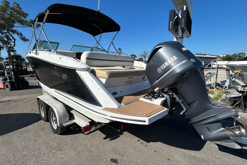 Slide: The Image of 2018 Cobalt 25SC boat with Yamaha outboard motor on trailer. - 5
