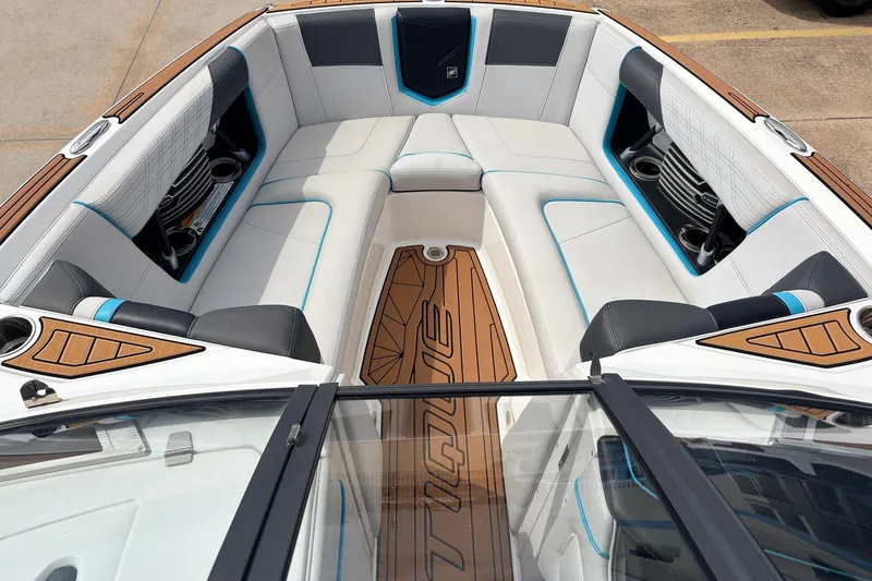 Slide: The Image of 2017 Nautique Super Air Nautique G23 boat interior with luxurious seating and stylish design. - 10