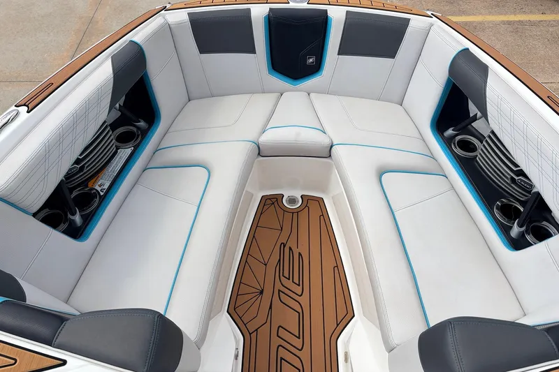 Slide: The Image of Luxurious interior of 2017 Nautique Super Air Nautique G23 boat with plush seating. - 13