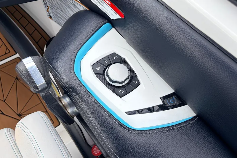 Slide: The Image of Control panel of 2017 Nautique Super Air Nautique G23 boat interior. - 39