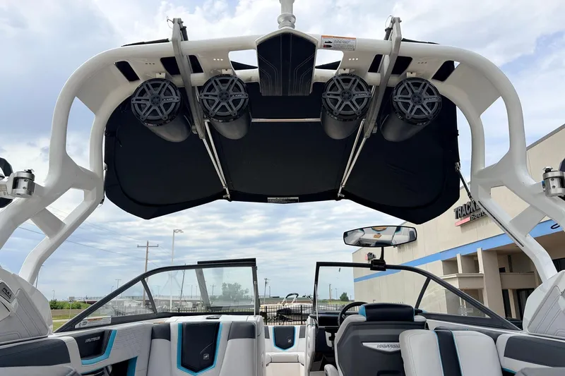Slide: The Image of 2017 Nautique Super Air Nautique G23 boat interior with speakers and seating. - 50