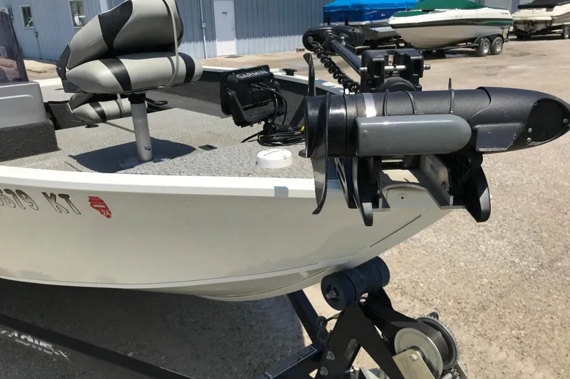 Slide: The Image of 2014 Lowe Fishing Machine 165SC Pro with trolling motor and Garmin fish finder. - 10