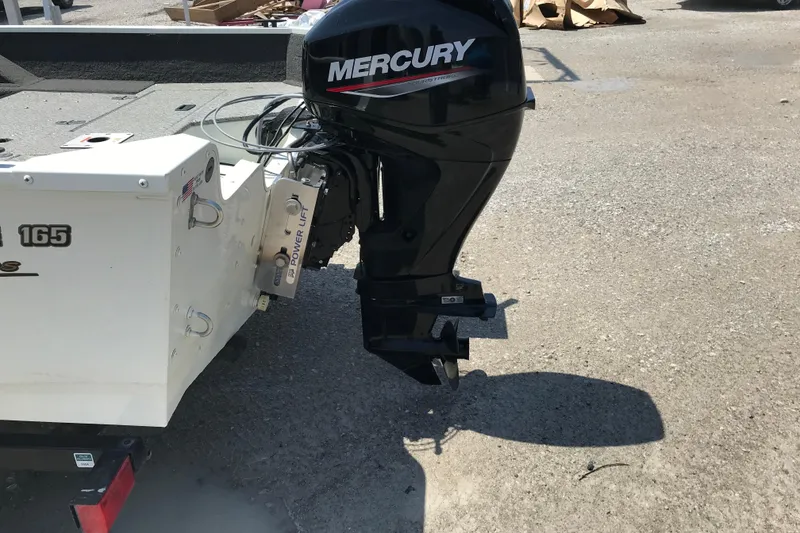 Slide: The Image of 2014 Lowe Fishing Machine 165SC Pro with Mercury outboard motor. - 3