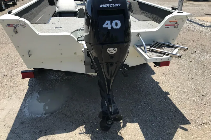 Slide: The Image of 2014 Lowe Fishing Machine 165SC Pro with Mercury 40 outboard motor, rear view. - 4