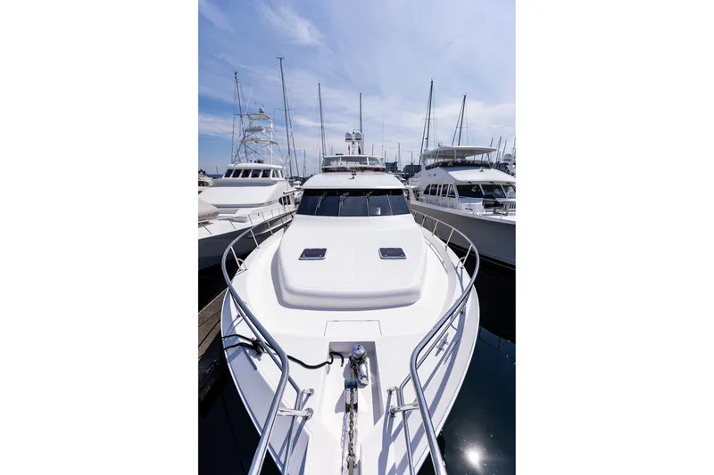 Slide: The Image of 2005 West Bay 86 Raised Pilothouse Motor Yacht docked at marina. - 150