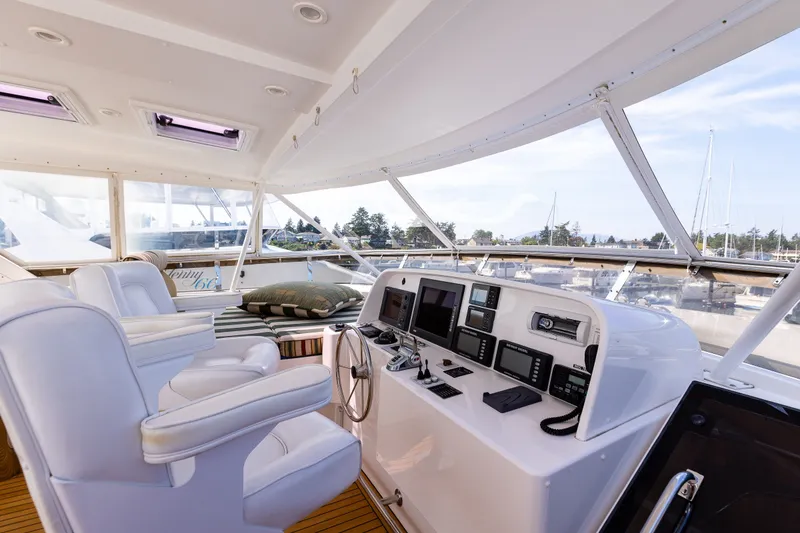Slide: The Image of Luxurious 2005 West Bay 86 Raised Pilothouse Motor Yacht interior with modern navigation equipment. - 99