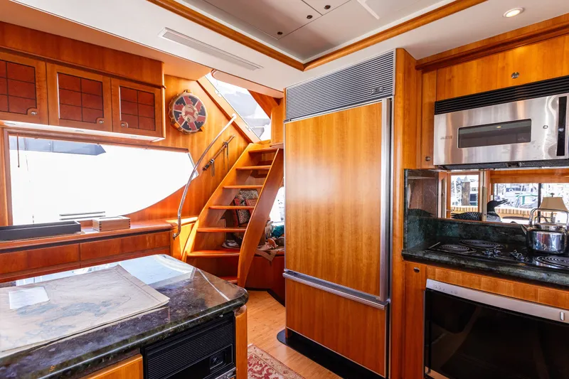 Slide: The Image of Luxurious kitchen interior of 2005 West Bay 86 Raised Pilothouse Motor Yacht. - 23