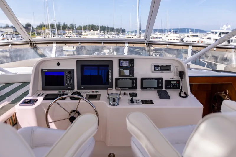 Slide: The Image of Cockpit of 2005 West Bay 86 Raised Pilothouse Motor Yacht with navigation equipment. - 101