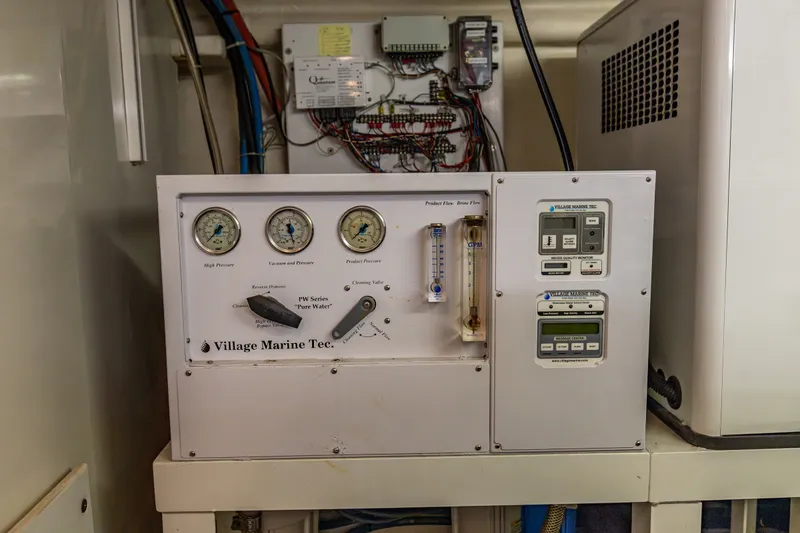 Slide: The Image of Control panel of a Village Marine Tec. watermaker on a 2005 West Bay 86 Yacht. - 134