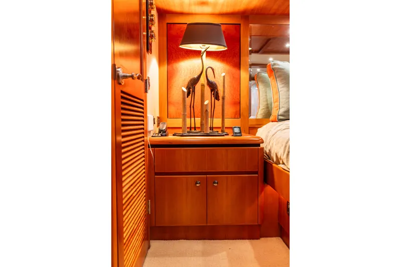 Slide: The Image of Luxurious wooden interior of 2005 West Bay 86 Raised Pilothouse Motor Yacht bedroom. - 68