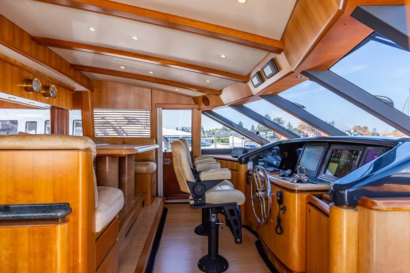 Slide: The Image of Luxurious 2005 West Bay 86 Raised Pilothouse Motor Yacht interior with modern navigation equipment. - 37