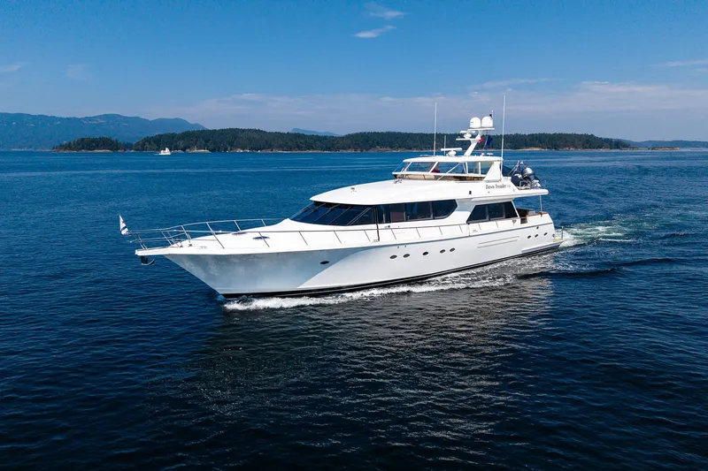 Slide: The Image of 2005 West Bay 86 Raised Pilothouse Motor Yacht cruising on open water. - 152