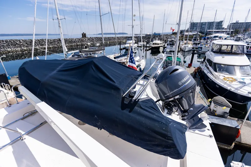 Slide: The Image of Covered boat on 2005 West Bay 86 Raised Pilothouse Motor Yacht, docked in marina. - 106