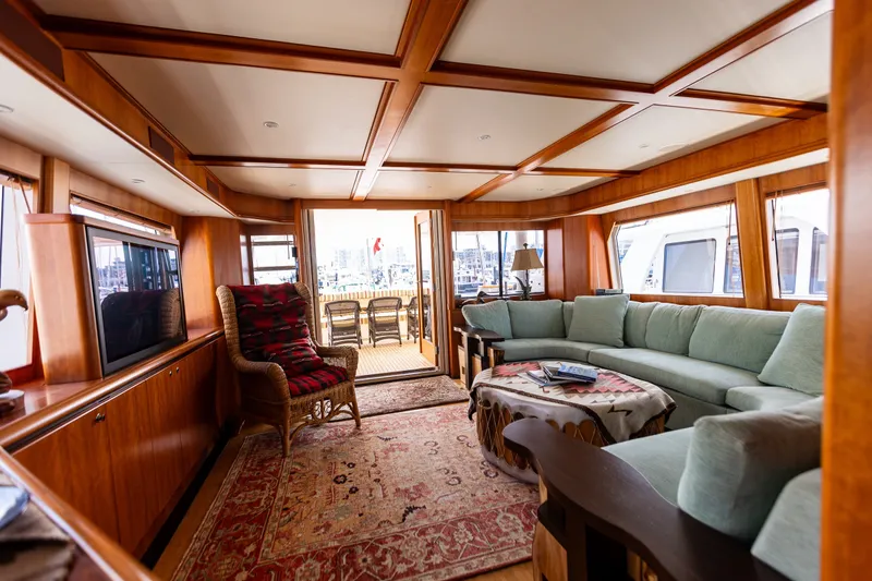Slide: The Image of Luxurious interior of 2005 West Bay 86 Raised Pilothouse Motor Yacht with elegant furnishings. - 19