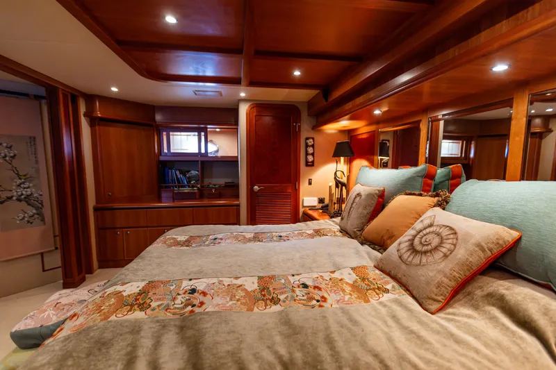 Slide: The Image of Luxurious bedroom interior of 2005 West Bay 86 Raised Pilothouse Motor Yacht. - 60