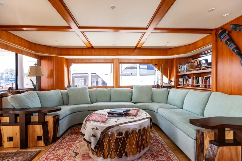 Slide: The Image of Luxurious interior of 2005 West Bay 86 Raised Pilothouse Motor Yacht with elegant seating and decor. - 16