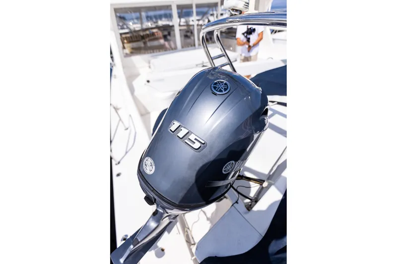 Slide: The Image of Close-up of a Yamaha 115 outboard motor on a 2005 West Bay yacht. - 107