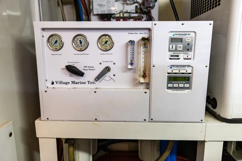 Slide: The Image of Village Marine Tec. water filtration system on 2005 West Bay 86 Raised Pilothouse Motor Yacht. - 135