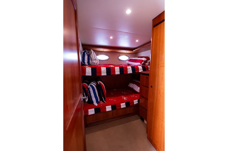 Slide: The Image of Bunk beds in 2005 West Bay 86 Raised Pilothouse Motor Yacht cabin. - 138