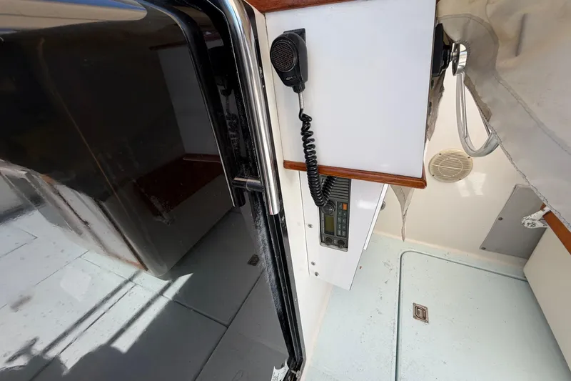 Slide: The Image of Interior view of a 1985 Formula 31 Performance Cruiser with radio equipment. - 40