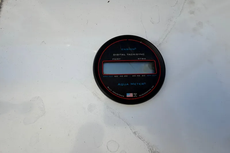Slide: The Image of Digital tachometer on 1985 Formula 31 Performance Cruiser, displaying RPM settings. - 46