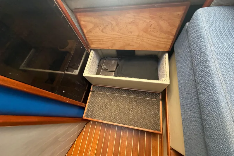 Slide: The Image of Interior storage compartment of a 1985 Formula 31 Performance Cruiser boat. - 57