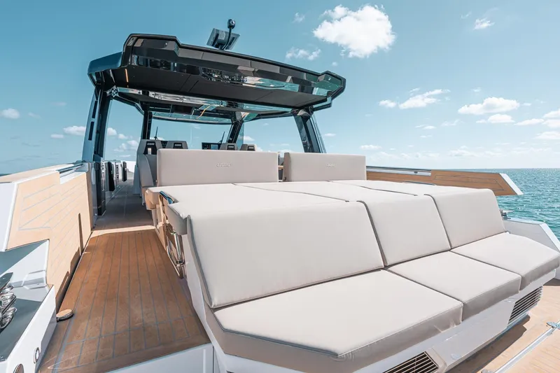 Slide: The Image of Luxury 2026 Fjord 490 SPORT yacht with spacious sun deck and sleek design on open water. - 5