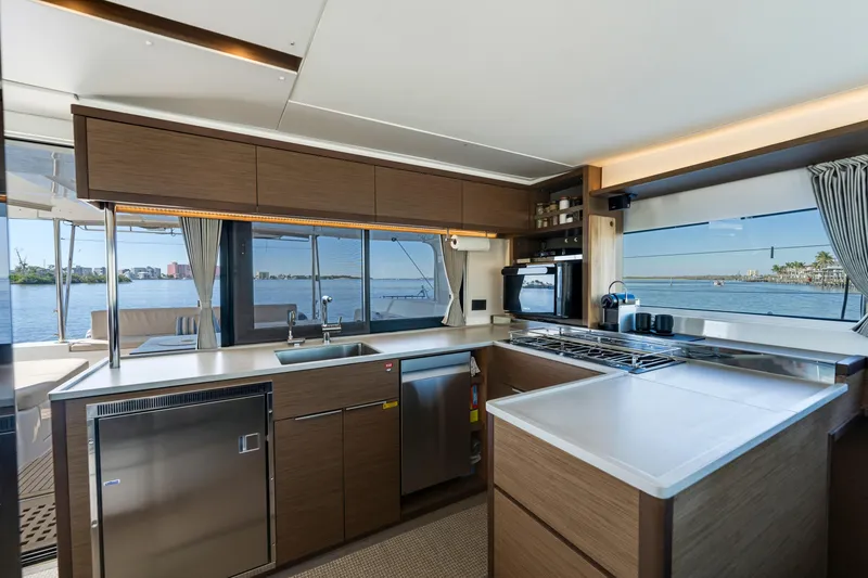 Slide: The Image of Modern kitchen interior on 2022 Lagoon 46 yacht with ocean view. - 17