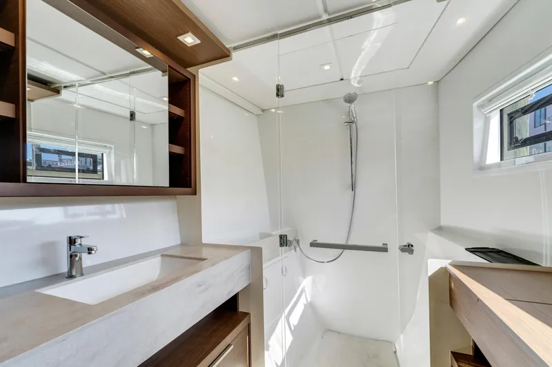 Slide: The Image of Luxurious bathroom interior of 2022 Lagoon 46 yacht with modern fixtures and sleek design. - 22