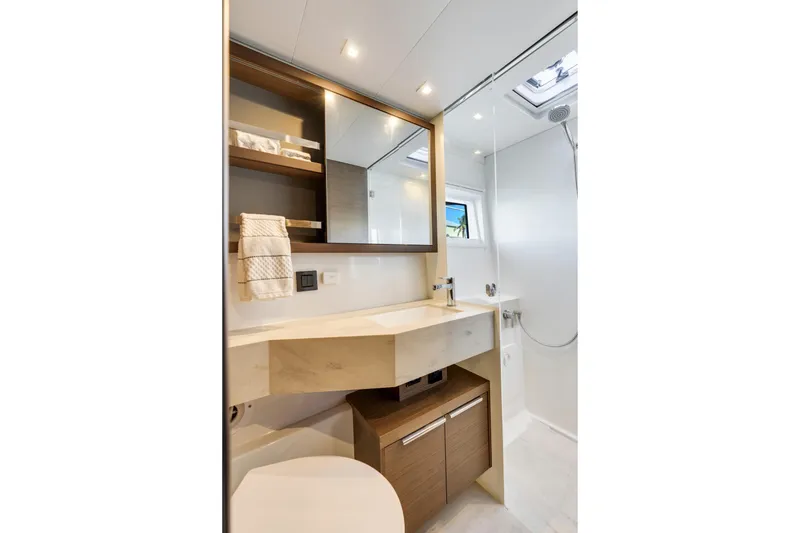 Slide: The Image of Modern bathroom interior of 2022 Lagoon 46 yacht, featuring sleek design and elegant fixtures. - 31